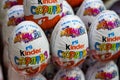 Russia - February 2021: Kinder surprise chocolate eggs on the window of a grocery store