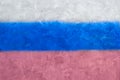 Russia flag on concrete wall. Patriotic grunge background. National flag of Russia Royalty Free Stock Photo