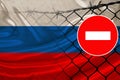 Russia flag on satin, fence with barbed wire, symbolic red sign no entry, entry prohibited, travel restrictions across European Royalty Free Stock Photo