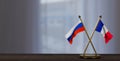 Russia and France flags on table. Negotiation between France and Russia. on little blur background. 3D work and 3D image Royalty Free Stock Photo