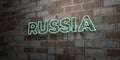 RUSSIA - Glowing Neon Sign on stonework wall - 3D rendered royalty free stock illustration