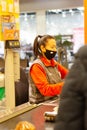 Russia, Ivanovo, November 29, 2020, editorial, the seller in a protective mask, the cashier