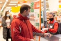 Russia, Ivanovo, November 29, 2020, editorial, the seller in a protective mask, the cashier