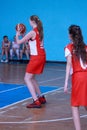 Russia, Izhevsk - April 26, 2017:Female high school basketball team playing game. Royalty Free Stock Photo