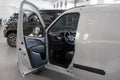 Russia, Izhevsk - August 20, 2021: Fiat showroom. Interior of new Doblo Cargo van in dealer showroom. Elements of opened driver