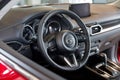 Russia, Izhevsk - August 06, 2020: Mazda showroom. Interior of new Mazda CX-5 car. Famous world brand