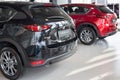 Russia, Izhevsk - August 06, 2020: Mazda showroom. New modern cars in the dealer showroom. Famous world brand