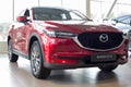 Russia, Izhevsk - August 06, 2020: Mazda showroom. New modern crossover CX-5. Front and side view