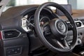 Russia, Izhevsk - August 06, 2020: Mazda showroom. Steering wheel and interior of new CX-5 car