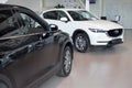 Russia, Izhevsk - August 06, 2020: New modern cars in the Mazda showroom. Famous world brand