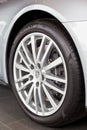 Russia, Izhevsk - August 04, 2020: Porsche showroom. The wheel with alloy wheel of a new Panamera 4 car. Famous brand