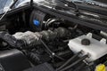 Russia, Izhevsk - August 20, 2021: UAZ showroom. Engine compartment of an internal combustion engine of new UAZ Patriot