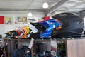 Russia, Izhevsk - August 23, 2019: Yamaha motorcycle shop. Row of helmets to protect the head of a motorcyclist