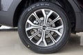 Russia, Izhevsk - February 17, 2022: KIA showroom. The wheel of Rio X car. Alloy wheel and Nexen tyre. Famous world