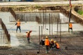 RUSSIA, KALUGA - AUGUST 15, 2022 : Concrete automatic pump tube working on construction site. Workers directing and Royalty Free Stock Photo