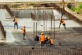 RUSSIA, KALUGA - AUGUST 15, 2022 : Concrete automatic pump tube working on construction site. Workers directing and Royalty Free Stock Photo