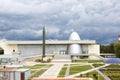 Russia, Kaluga, August 14, 2020. Kaluga Museum of Cosmonautics. Rocket, planetarium dome, park in front of the building,