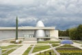 Russia, Kaluga, August 14, 2020. Kaluga Museum of Cosmonautics. Rocket, planetarium dome, park in front of the building,