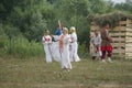 RUSSIA, KALUGA REGION, DZERZHINSKY DISTRICT, DVORTSY - JUL 14, 2018: Reconstruction of military operations in 1480. Girls in tradi