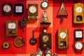 Russia, Kamensk-Shakhtinsky - museum of the USSR, many wall clocks on a red wall, Free open