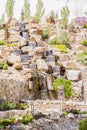 2021-05-07. Russia. Kamensk-Shakhtinsky, Rostov region. Beautiful decor elements in the park for tourists. Waterfall among the