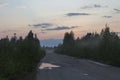 Russia, Karelia. White nights, forest road at sunset