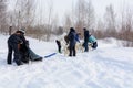 Russia. Kazan. 14 Feb. Dog sled team of siberian huskies out mushing on snow pulling a sled that is out of frame through a winter