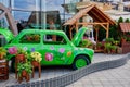 Russia, Kazan June 2019. Flowerbed with flowers in the form of an old car Royalty Free Stock Photo