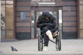 Russia, Kazan 14 september 2016, dowmtown - Disabled homeless man on a wheelchair begging for money - drunk beggar