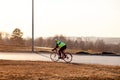 Russia Kemerovo 2019-04-11 Cycling competition, cyclist athletes in helmet and uniform tinkoff team riding race at high speed on Royalty Free Stock Photo