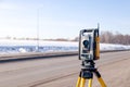 Russia Kemerovo 2019-03-15. Land surveyor equipment. Robotic total station theodolite standing on tripod. Equipment used for