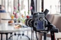 Russia Kemerovo 2019-03-10 professional camera Canon 5D Mark II and many different dishes, fish, salads on table in restaurant. Royalty Free Stock Photo