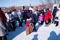 Celebrating the end of winter, children playing games