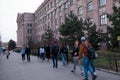 Young people walking in the city center near the medical University