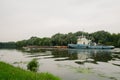 08/21/2021 Russia, Kolomna. An old rusty barge sails by on the Moscow River in summer