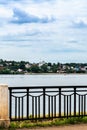 Russia  Kostroma  July 2020. Embankment fencing and a view of the opposite bank. Royalty Free Stock Photo