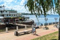 Russia, Kostroma, July 2020.Promenade and motor ship at the pier.