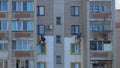09 21 2021 Russia Kostroma Workers insulate the walls of an apartment building with foam