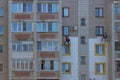 09 21 2021 Russia Kostroma Workers insulate the walls of an apartment building with foam