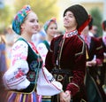 Procession of students of the Institute of culture, dancers in Cossack traditional dress, colored skirt, green trousers and maroon