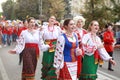 Procession of students of the Institute of culture, dancers in Cossack traditional dress, colored skirt, green trousers and maroon