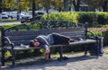 Russia,Krasnodar 29 september 2018 Hobo sleeps on a bench in the city