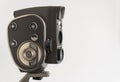 Russia, Krasnoyarsk, December 2019: Soviet cinema camera quartz 2M on a tripod, white background