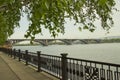 Russia, Krasnoyarsk, June 2019: Embankment of the Yenisei river and Communal bridge Royalty Free Stock Photo