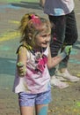 Russia, Krasnoyarsk, June 2019: a little girl at the festival of colors Holi Royalty Free Stock Photo