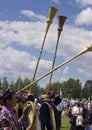 Uzbeks play long brass musical instruments