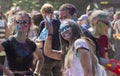 Russia, Krasnoyarsk, June 2019: Young people play with colors. The concept of the Indian festival of Holi