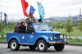 Russia, Magnitogorsk, August 2, 2019. A group of paratroopers travels around the city in an old Russian convertible during the