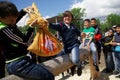 Russia, Magnitogorsk, - June, 15, 2019. Boys enthusiastically fight bags on a log during the holiday Sabantuy. National game