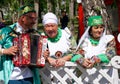 Russia, Magnitogorsk, - June, 15, 2019. A man with an accordion and women in national costumes of Bashkortostan and Tatarstan -